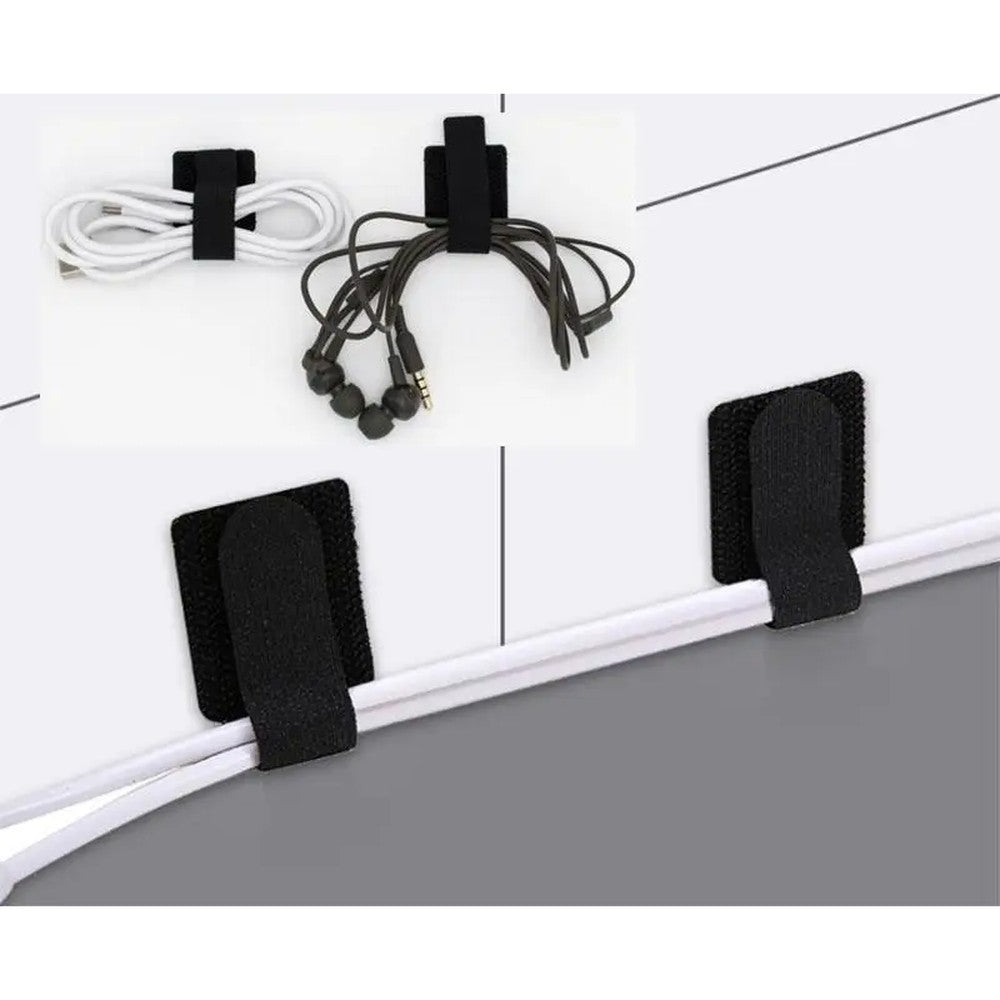 Kabel-Klettbinder an der Wand halten Kabel und Ohrhörer